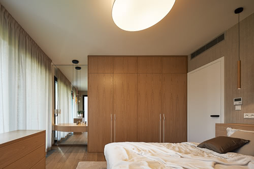 Fotografie ložnice v mezonetu v Praze